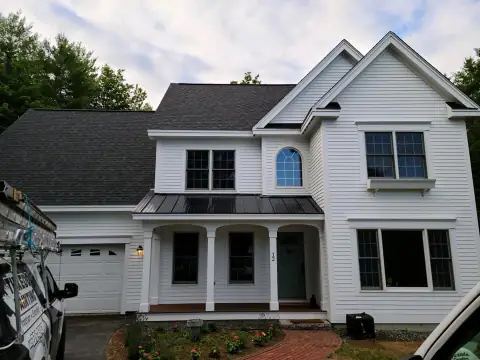 Exterior house painting project in New Hampshire