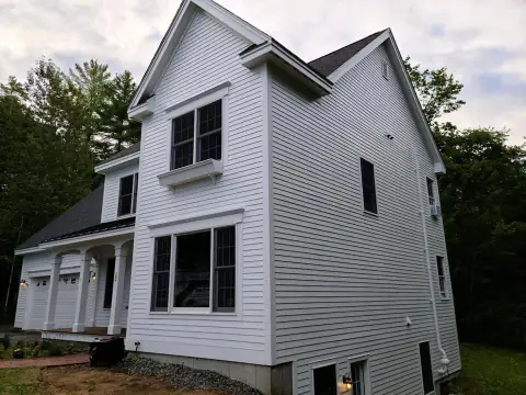 Exterior house painting project in New Hampshire